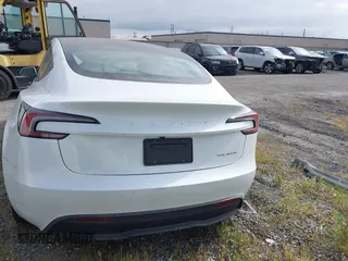 2024 Tesla Model 3 Long Range with VIN 5YJ3E1EB7RF854092, listed as a IAAI auction lot 41697646 with 7,371 mi miles and . Bid and sale history available at DreamBid. Image 16.