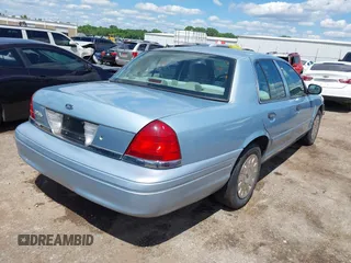 2008 Ford Crown Victoria z VIN 2FAFP73V28X126398, wystawiony jako IAAI lot #42349725 z przebiegiem Nie podano mil oraz . Historia ofert i sprzedaży dostępna na DreamBid. Obrazek 4.