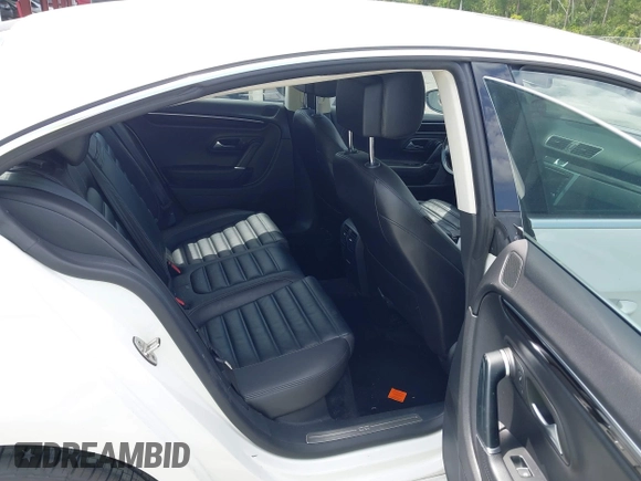 2014 Volkswagen CC Executive z VIN WVWRP7AN7EE537318, wystawiony jako IAAI lot #42308532 z przebiegiem 217 059 mil mil oraz . Historia ofert i sprzedaży dostępna na DreamBid. Obrazek 8.