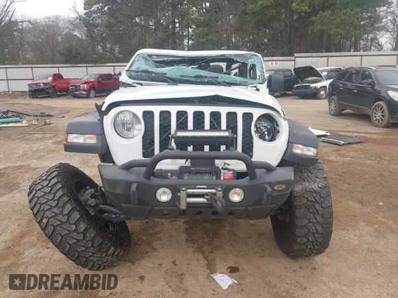 2020 Jeep Gladiator Sport S с VIN 1C6JJTAG1LL204637, выставлен на аукционе IAAI как лот 41743343 с пробегом 94 305 миль миль и . История ставок и продаж доступна на DreamBid. Изображение 13.