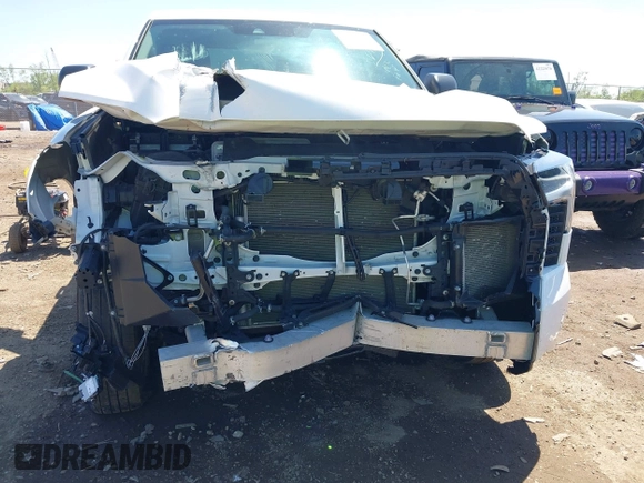 2023 Toyota Tundra SR with VIN 5TFKB5DB0PX065072, listed as a IAAI auction lot 42226348 with 53,539 mi miles and . Bid and sale history available at DreamBid. Image 6.