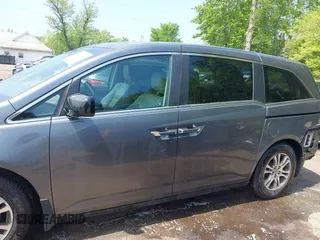 2012 Honda Odyssey EX-L with VIN 5FNRL5H67CB041252, listed as a IAAI auction lot 42158494 with 152,940 mi miles and . Bid and sale history available at DreamBid. Image 15.