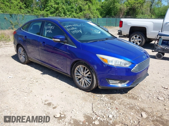 2015 Ford Focus Titanium with VIN 1FADP3J20FL304828, listed as a IAAI auction lot 42144101 with 199,715 mi miles and . Bid and sale history available at carsss.com. Image 1.