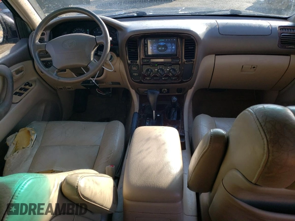 1999 Toyota Land Cruiser with VIN JT3HT05J5X0072564, listed as a Copart auction lot 77000044 with 312,428 mi miles and Salvage Title. Bid and sale history available at carsss.com. Image 8.