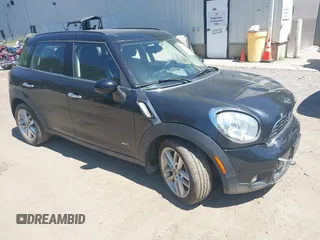 2011 MINI Countryman S with VIN WMWZC5C56BWM10608, listed as a IAAI auction lot 42797339 with 119,520 mi miles and . Bid and sale history available at DreamBid. Image 1.