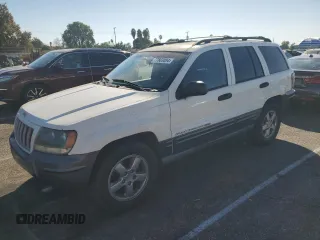 2004 Jeep Grand Cherokee with VIN 1J4GX48JX4C301369, listed as a Copart auction lot 77803094 with 179,404 mi miles and Clean title. Bid and sale history available at DreamBid. Image 1.