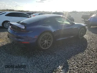 2021 Porsche 911 Carrera with VIN WP0AA2A97MS206873, listed as a Copart auction lot 77359214 with 1,036 mi miles and Salvage Title. Bid and sale history available at carsss.com. Image 3.