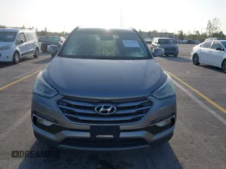 2017 Hyundai Santa Fe 2.4L z VIN 5XYZU3LB0HG420910, wystawiony jako IAAI lot #42017552 z przebiegiem 184 666 mil mil oraz . Historia ofert i sprzedaży dostępna na DreamBid. Obrazek 12.