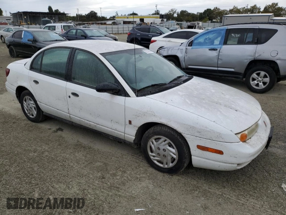 2001 Saturn SL with VIN 1G8ZF52891Z237485, listed as a Copart auction lot 76174574 with 130,525 mi miles and Salvage title. Bid and sale history available at DreamBid. Image 4.