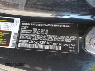 2013 MINI Hardtop S with VIN WMWSV3C52DT393181, listed as a Copart auction lot 50179065 with 66,655 mi miles and Salvage Title. Bid and sale history available at DreamBid. Image 14.
