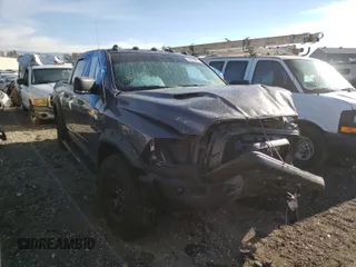 2018 Ram 1500 Rebel with VIN 1C6RR7YT1JS161619, listed as a Copart auction lot 60226061 with 49,567 mi miles and Salvage Title. Bid and sale history available at carsss.com. Image 1.