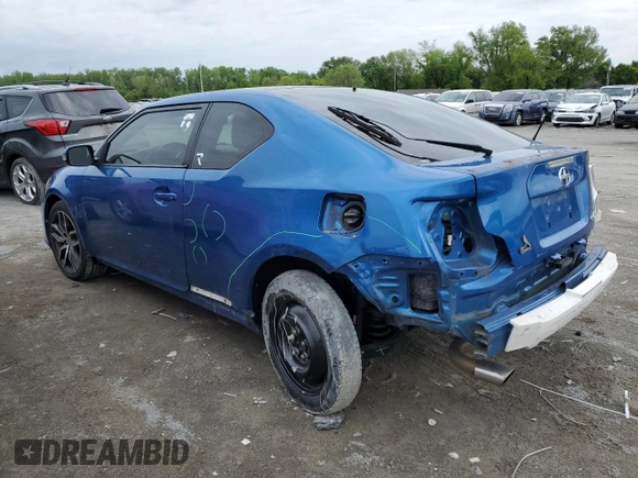2016 Scion tC with VIN JTKJF5C71GJ014138, listed as a Copart auction lot 52180984 with 71,502 mi miles and Salvage Title. Bid and sale history available at carsss.com. Image 2.