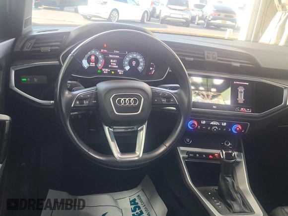 2023 Audi Q3 S line Premium with VIN WA1DECF34P1106228, listed as a IAAI auction lot 42734425 with 52,167 mi miles and . Bid and sale history available at DreamBid. Image 41.