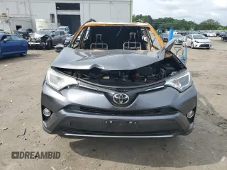2018 Toyota RAV4 XLE with VIN JTMWFREV2JD125190, listed as a Copart auction lot 60484965 with Not provided miles and Salvage title. Bid and sale history available at DreamBid. Image 5.