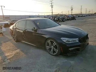 2017 BMW 7 Series 750i with VIN WBA7F0C57HGM21136, listed as a Copart auction lot 88525335 with 102,508 mi miles and Salvage Title. Bid and sale history available at carsss.com. Image 11.