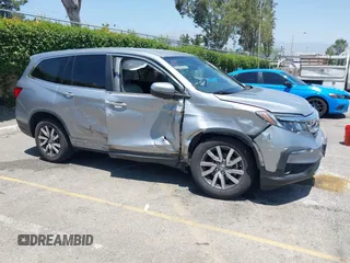 2019 Honda Pilot EX z VIN 5FNYF5H30KB035591, wystawiony jako IAAI lot #42312961 z przebiegiem 87 328 mil mil oraz . Historia ofert i sprzedaży dostępna na DreamBid. Obrazek 1.