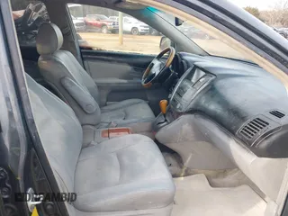 2007 Lexus RX 400h z VIN JTJGW31U372002594, wystawiony jako IAAI lot #41380924 z przebiegiem 243 928 mil mil oraz . Historia ofert i sprzedaży dostępna na DreamBid. Obrazek 5.