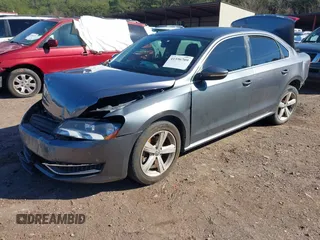 2012 Volkswagen Passat SE with VIN 1VWBH7A36CC027321, listed as a IAAI auction lot 41596709 with 173,357 mi miles and . Bid and sale history available at DreamBid. Image 2.