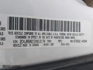 2013 Ram Cargo Van Tradesman with VIN 2C4JRGAG1DR812174, listed as a IAAI auction lot 42114559 with 208,252 mi miles. Bid and sale history available at carsss.com. Image 9.