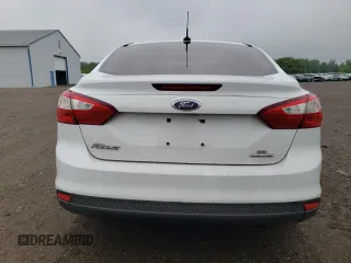 2013 Ford Focus SE z VIN 1FADP3F25DL204052, wystawiony jako Copart lot #57662695 z przebiegiem 124 916 mil mil oraz Szkoda całkowita • Salvage title. Historia ofert i sprzedaży dostępna na DreamBid. Obrazek 6.