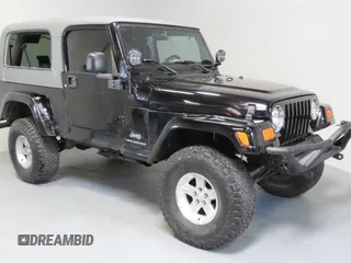 2005 Jeep Wrangler Unlimited with VIN 1J4FA44S75P305935, listed as a Copart auction lot 65582205 with 116,569 mi miles and Salvage title. Bid and sale history available at DreamBid. Image 1.