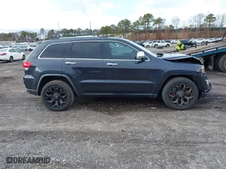 2014 Jeep Grand Cherokee Limited with VIN 1C4RJFBT7EC258715, listed as a IAAI auction lot 41735925 with 103,215 mi miles. Bid and sale history available at carsss.com. Image 13.