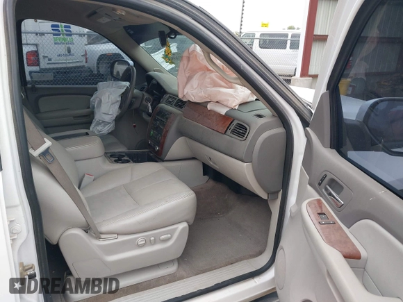 2013 Chevrolet Suburban LT with VIN 1GNSCJE05DR147101, listed as a IAAI auction lot 42336950 with 147,429 mi miles and . Bid and sale history available at DreamBid. Image 5.