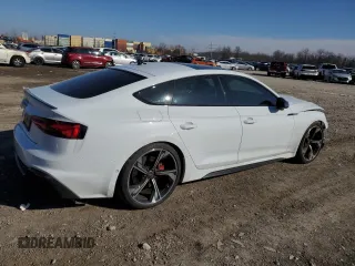 2023 Audi RS 5 Sportback z VIN WUAAWCF55PA900214, wystawiony jako Copart lot #42182554 z przebiegiem 13 302 mil mil oraz . Historia ofert i sprzedaży dostępna na DreamBid. Obrazek 3.