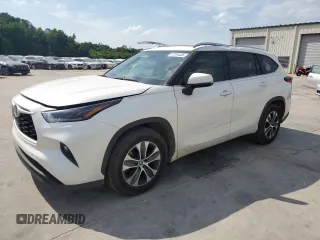 2021 Toyota Highlander XLE with VIN 5TDGZRAH3MS521049, listed as a Copart auction lot 57284435 with 103,080 mi miles and Salvage title. Bid and sale history available at DreamBid. Image 1.