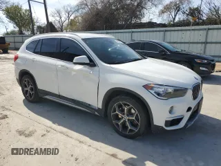 2019 BMW X1 sDrive28i with VIN WBXHU7C52K3H44195, listed as a Copart auction lot 42304175 with 88,929 mi miles and Salvage Title. Bid and sale history available at carsss.com. Image 4.