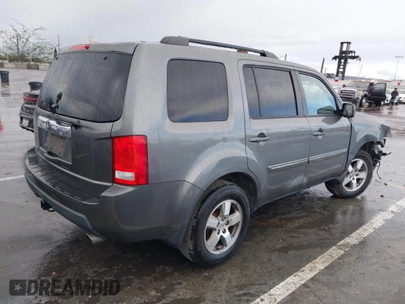 2011 Honda Pilot EX with VIN 5FNYF3H49BB026174, listed as a IAAI auction lot 41795460 with 201,488 mi miles and . Bid and sale history available at carsss.com. Image 4.