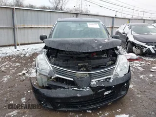 2009 Nissan Versa 1.8 SL with VIN 3N1BC13E49L427102, listed as a IAAI auction lot 41553357 with 133,300 mi miles. Bid and sale history available at carsss.com. Image 12.