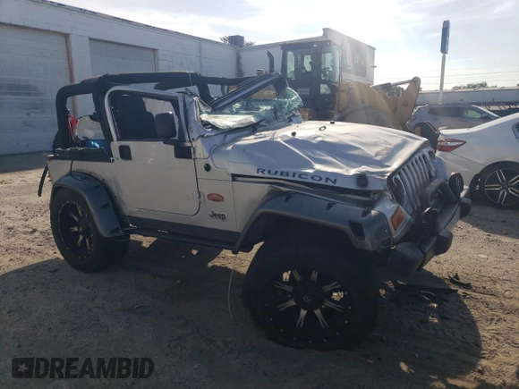 2003 Jeep Wrangler Rubicon z VIN 1J4FA69S53P375189, wystawiony jako Copart lot #54292035 z przebiegiem 55 863 mil mil oraz Szkoda całkowita • Salvage title. Historia ofert i sprzedaży dostępna na DreamBid. Obrazek 4.