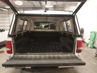 2010 Ford Ranger XLT with VIN 1FTLR4FE4APA76083, listed as a IAAI auction lot 39763204 with 180,324 mi miles and . Bid and sale history available at DreamBid. Image 18.