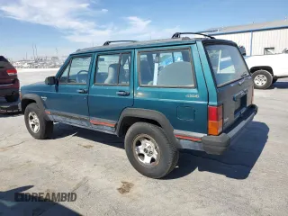 1996 Jeep Cherokee Sport with VIN 1J4FJ68S3TL257912, listed as a Copart auction lot 77109634 with 53,841 mi miles and Clean Title. Bid and sale history available at carsss.com. Image 2.