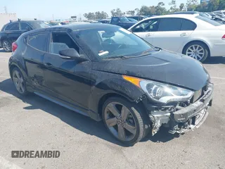 2014 Hyundai Veloster Turbo with VIN KMHTC6AE6EU203990, listed as a IAAI auction lot 42450163 with 37,996 mi miles and . Bid and sale history available at DreamBid. Image 1.