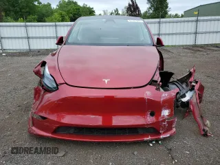 2024 Tesla Model Y Long Range с VIN 7SAYGDEE6RF128495, выставлен на аукционе Copart как лот 61127095 с пробегом Не указан миль и Списание • Salvage title. История ставок и продаж доступна на DreamBid. Изображение 5.