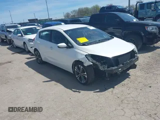 2016 Kia Forte EX with VIN KNAFX5A84G5628970, listed as a IAAI auction lot 42098764 with 92,003 mi miles and . Bid and sale history available at carsss.com. Image 1.