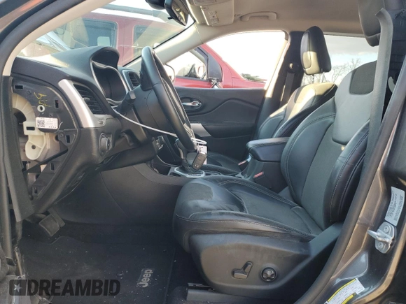 2018 Jeep Cherokee Latitude Plus with VIN 1C4PJLLB1JD510183, listed as a Copart auction lot 85849904 with 86,787 mi miles and Salvage Title. Bid and sale history available at DreamBid. Image 7.