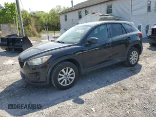 2015 Mazda CX-5 Touring with VIN JM3KE4CY6F0434538, listed as a Copart auction lot 54966145 with 209,447 mi miles and Clean Title. Bid and sale history available at DreamBid. Image 1.