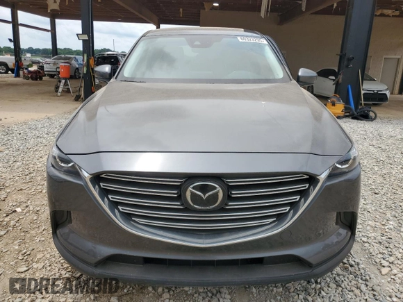 2020 Mazda CX-9 Touring z VIN JM3TCACY3L0411822, wystawiony jako Copart lot #60323295 z przebiegiem 61 348 mil mil oraz Szkoda całkowita • Salvage title. Historia ofert i sprzedaży dostępna na DreamBid. Obrazek 5.
