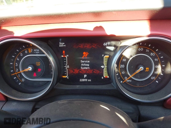 2023 Jeep Gladiator Rubicon with VIN 1C6JJTBG6PL538859, listed as a IAAI auction lot 42633055 with 22,899 mi miles and . Bid and sale history available at DreamBid. Image 7.