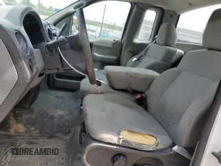 2007 Ford F-150 XL with VIN 1FTRF122X7NA00997, listed as a Copart auction lot 59664585 with 295,172 mi miles and Salvage title. Bid and sale history available at DreamBid. Image 7.