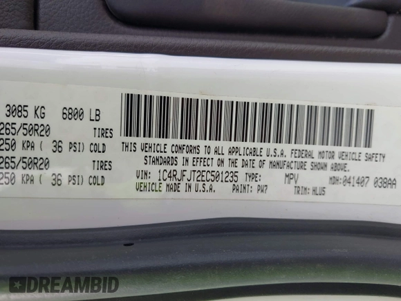 2014 Jeep Grand Cherokee Summit with VIN 1C4RJFJT2EC501235, listed as a IAAI auction lot 42622790 with 160,000 mi miles and . Bid and sale history available at DreamBid. Image 9.