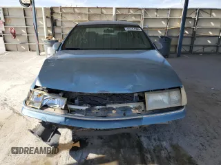 1990 Mercury Sable z VIN 1MECM5348LG630484, wystawiony jako Copart lot #45757565 z przebiegiem 98 764 mil mil oraz Szkody całkowita. Historia ofert i sprzedaży dostępna na DreamBid. Obrazek 5.