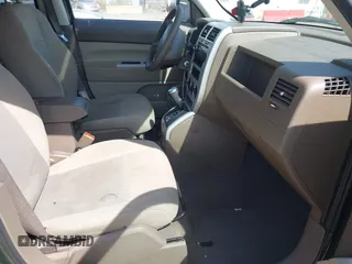 2008 Jeep Patriot Sport with VIN 1J8FF28W98D785130, listed as a IAAI auction lot 42069574 with 180,092 mi miles. Bid and sale history available at carsss.com. Image 5.