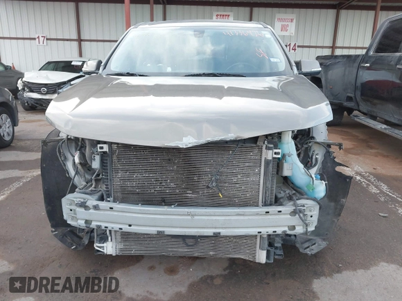 2018 Chevrolet Traverse LT Cloth z VIN 1GNERGKW9JJ173766, wystawiony jako IAAI lot #41336426 z przebiegiem 108 910 mil mil oraz . Historia ofert i sprzedaży dostępna na DreamBid. Obrazek 13.