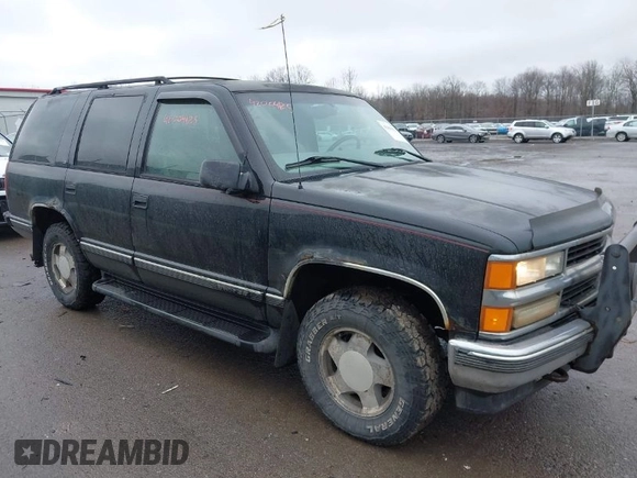 1999 Chevrolet Tahoe Z71 z VIN 1GNEK13R9XJ515820, wystawiony jako IAAI lot #42004125 z przebiegiem 251 184 mil mil oraz . Historia ofert i sprzedaży dostępna na DreamBid. Obrazek 1.