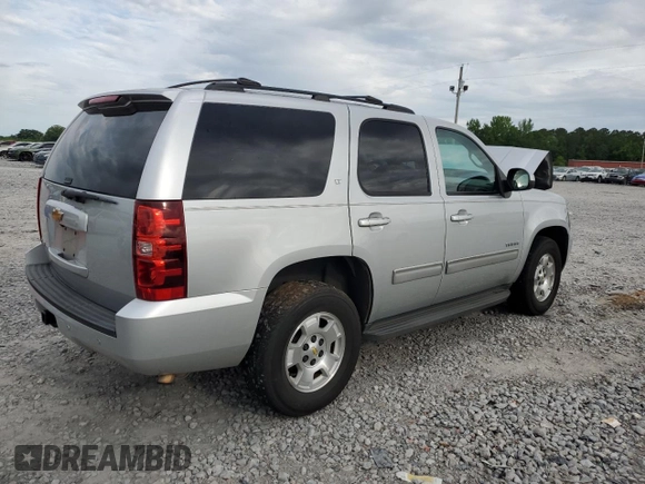 2014 Chevrolet Tahoe LT with VIN 1GNSCBE0XER117275, listed as a Copart auction lot 55858125 with 163,061 mi miles and Salvage title. Bid and sale history available at DreamBid. Image 3.