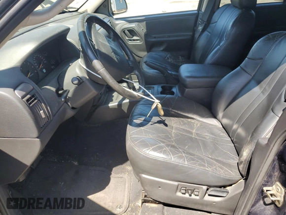 2004 Jeep Grand Cherokee Laredo with VIN 1J4GW48N34C425845, listed as a Copart auction lot 61200555 with 133,664 mi miles and Clean title. Bid and sale history available at DreamBid. Image 7.
